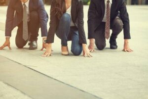 business people at starting line ready to implement erp