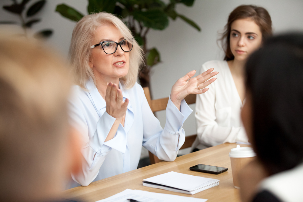 small business meeting about erp software